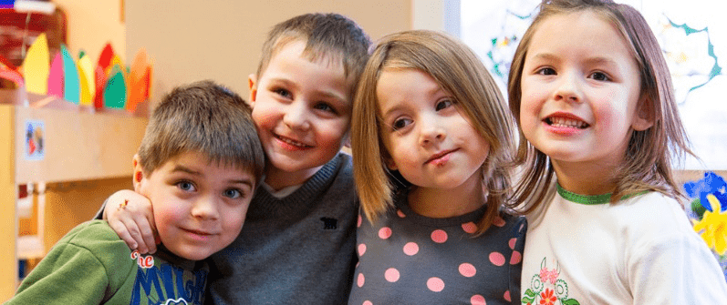 Children smiling during church ministry